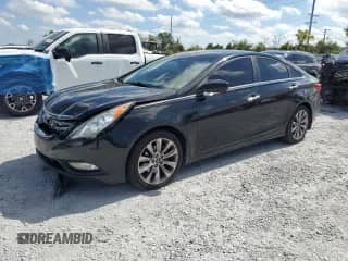 2013 Hyundai Sonata Limited z VIN 5NPEC4AC4DH810706, wystawiony jako Copart lot #87311985 z przebiegiem 205 503 mil mil oraz Szkoda całkowita • Salvage title. Historia ofert i sprzedaży dostępna na DreamBid. Obrazek 1.