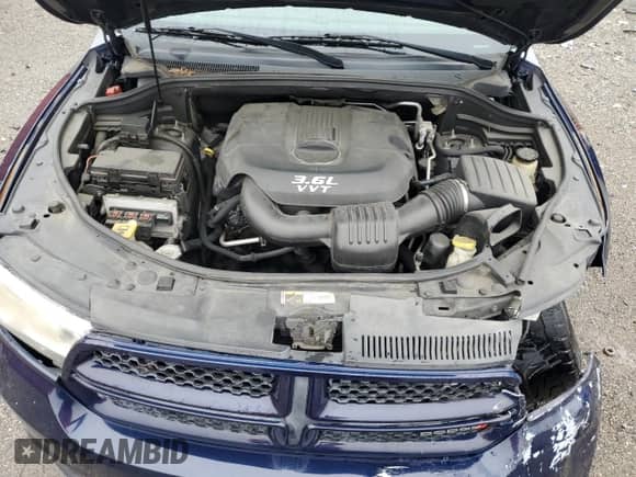 2013 Dodge Durango Special Service z VIN 1C4RDJFG2DC669736, wystawiony jako Copart lot #57958885 z przebiegiem 98 709 mil mil oraz Szkoda całkowita • Salvage title. Historia ofert i sprzedaży dostępna na DreamBid. Obrazek 12.