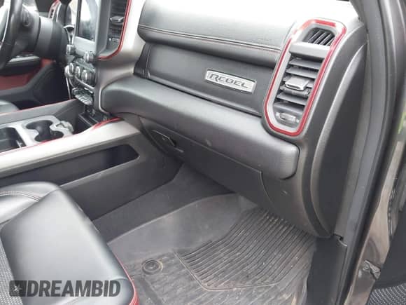 2019 Ram 1500 Rebel z VIN 1C6SRFLT9KN648795, wystawiony jako IAAI lot #38853577 z przebiegiem 75 292 mil mil oraz . Historia ofert i sprzedaży dostępna na DreamBid. Obrazek 20.