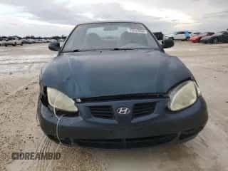 2000 Hyundai Elantra GLS with VIN KMHJF35F3YU002102, listed as a Copart auction lot 73243004 with 79,155 mi miles and Salvage title. Bid and sale history available at DreamBid. Image 5.