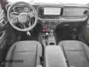 2025 Jeep Wrangler Rubicon with VIN 1C4RJXR6XSW572214, listed as a Copart auction lot 80516205 with 8,697 mi miles and Non repairable. Bid and sale history available at DreamBid. Image 8.