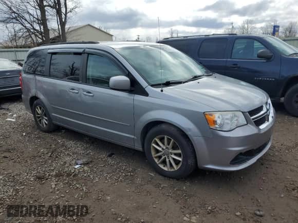 2014 Dodge Grand Caravan SXT 30th Anniversary with VIN 2C4RDGCG5ER349309, listed as a Copart auction lot 50149715 with 184,058 mi miles and Clean title. Bid and sale history available at DreamBid. Image 4.