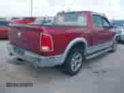 2014 Ram 1500 Laramie with VIN 1C6RR6NT0ES314947, listed as a IAAI auction lot 42934662 with 195,174 mi miles and . Bid and sale history available at DreamBid. Image 4.