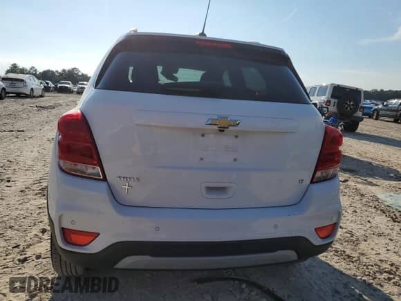 2020 Chevrolet Trax LT with VIN KL7CJLSB9LB318652, listed as a Copart auction lot 70552275 with 57,051 mi miles and Salvage title. Bid and sale history available at DreamBid. Image 6.