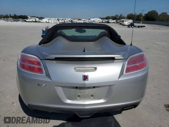 2007 Saturn Sky с VIN 1G8MB35B57Y116288, выставлен на аукционе Copart как лот 84903585 с пробегом 99 777 миль миль и Списание • Salvage title. История ставок и продаж доступна на DreamBid. Изображение 6.