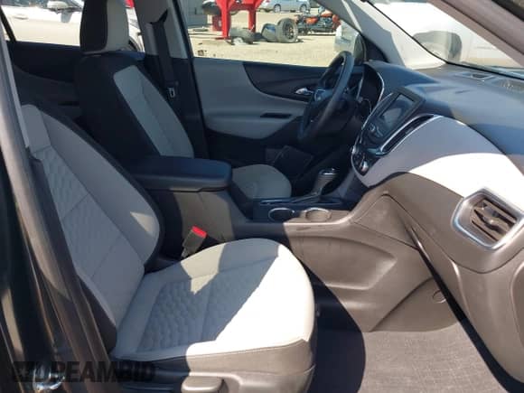 2021 Chevrolet Equinox LS z VIN 2GNAXHEVXM6121965, wystawiony jako IAAI lot #42832073 z przebiegiem 98 992 mil mil oraz . Historia ofert i sprzedaży dostępna na DreamBid. Obrazek 5.