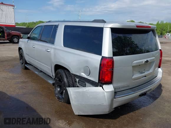 2018 Chevrolet Suburban Premier z VIN 1GNSKJKC8JR382279, wystawiony jako IAAI lot #42129937 z przebiegiem 107 799 mil mil oraz . Historia ofert i sprzedaży dostępna na DreamBid. Obrazek 6.