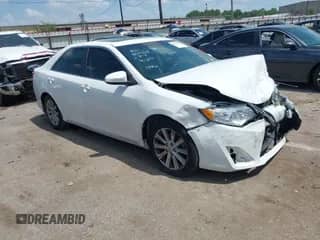 2014 Toyota Camry L z VIN 4T4BF1FK4ER371346, wystawiony jako IAAI lot #42846544 z przebiegiem 131 704 mil mil oraz . Historia ofert i sprzedaży dostępna na DreamBid. Obrazek 1.