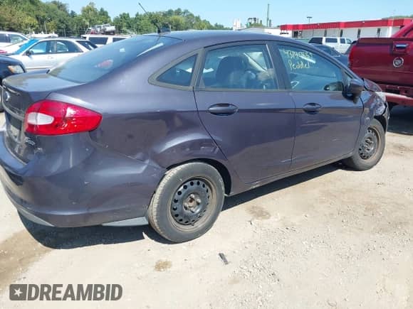 2012 Ford Fiesta SE with VIN 3FADP4BJ8CM123319, listed as a IAAI auction lot 43147857 with 122,046 mi miles and . Bid and sale history available at DreamBid. Image 4.