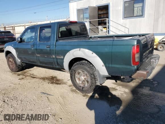 2002 Nissan Frontier SE с VIN 1N6ED29XX2C318082, выставлен на аукционе Copart как лот 82636985 с пробегом 368 485 миль миль и Чистый • Clean title. История ставок и продаж доступна на DreamBid. Изображение 2.