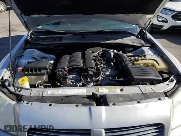 2006 Dodge Magnum z VIN 2D4FV47V76H494448, wystawiony jako Copart lot #82257374 z przebiegiem 155 877 mil mil oraz Szkoda całkowita • Salvage title. Historia ofert i sprzedaży dostępna na DreamBid. Obrazek 11.