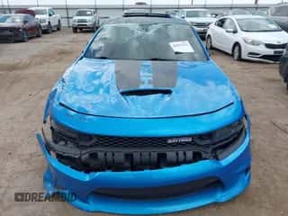 2023 Dodge Charger R/T with VIN 2C3CDXCT7PH612318, listed as a IAAI auction lot 43021076 with 62,888 mi miles and . Bid and sale history available at DreamBid. Image 6.