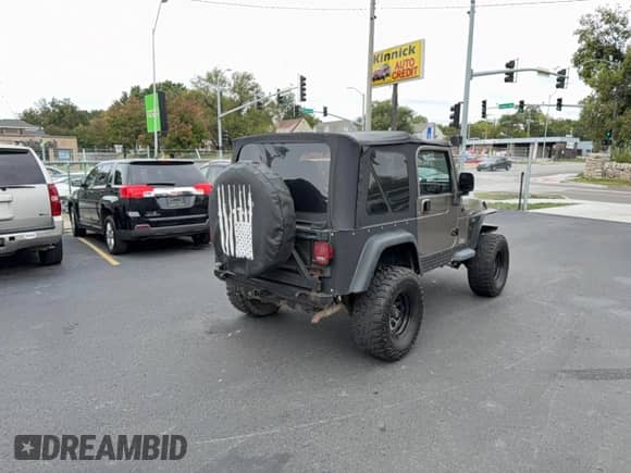 2004 Jeep Wrangler X z VIN 1J4FA39S64P753911, wystawiony jako Copart lot #86479285 z przebiegiem 138 801 mil mil oraz Czysty tytuł • Clean title. Historia ofert i sprzedaży dostępna na DreamBid. Obrazek 4.