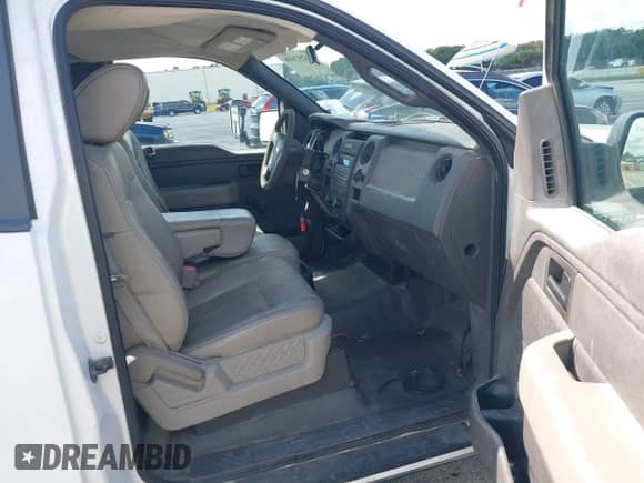 2009 Ford F-150 XL with VIN 1FTRF12W59KC51918, listed as a IAAI auction lot 43257608 with 145,403 mi miles and . Bid and sale history available at DreamBid. Image 5.