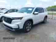 2024 Honda Pilot EX-L with VIN 5FNYG2H55RB008152, listed as a IAAI auction lot 42651116 with 19,679 mi miles and . Bid and sale history available at DreamBid. Image 2.