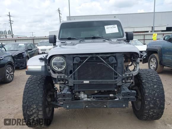 2021 Jeep Wrangler Unlimited Rubicon with VIN 1C4HJXFNXMW524545, listed as a IAAI auction lot 42774766 with 115,439 mi miles and . Bid and sale history available at DreamBid. Image 13.