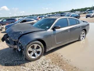 2014 Dodge Charger SE с VIN 2C3CDXBG5EH138158, выставлен на аукционе Copart как лот 71087935 с пробегом 181 738 миль миль и Списание • Salvage title. История ставок и продаж доступна на DreamBid. Изображение 1.
