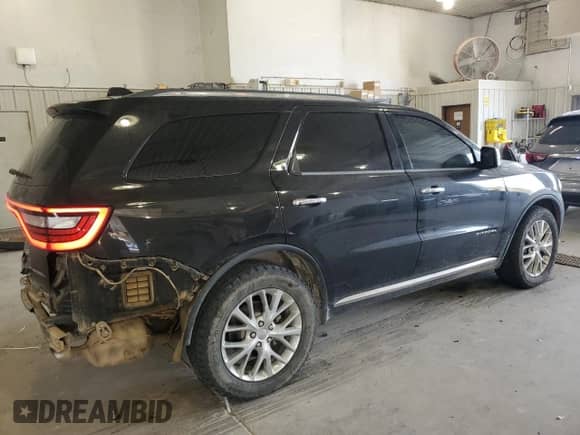2014 Dodge Durango Citadel with VIN 1C4RDJEG1EC345292, listed as a Copart auction lot 80712465 with 124,016 mi miles and Salvage title. Bid and sale history available at DreamBid. Image 3.