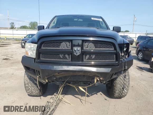 2012 Ram 1500 Express z VIN 3C6JD7AT9CG157060, wystawiony jako Copart lot #64777895 z przebiegiem 142 102 mil mil oraz Szkoda całkowita • Salvage title. Historia ofert i sprzedaży dostępna na DreamBid. Obrazek 5.