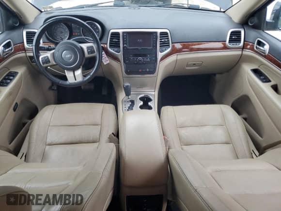 2012 Jeep Grand Cherokee Limited z VIN 1C4RJFBG8CC300891, wystawiony jako Copart lot #84041155 z przebiegiem 141 239 mil mil oraz Czysty tytuł • Clean title. Historia ofert i sprzedaży dostępna na DreamBid. Obrazek 8.