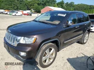 2012 Jeep Grand Cherokee Overland z VIN 1C4RJFCT4CC310653, wystawiony jako Copart lot #66598745 z przebiegiem 184 524 mil mil oraz Czysty tytuł • Clean title. Historia ofert i sprzedaży dostępna na DreamBid. Obrazek 1.