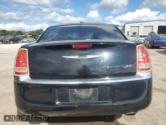 2012 Chrysler 300 with VIN 2C3CCAAGXCH176113, listed as a Copart auction lot 81804825 with 122,140 mi miles and Salvage title. Bid and sale history available at DreamBid. Image 6.