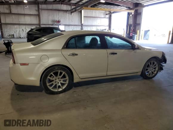 2012 Chevrolet Malibu LTZ with VIN 1G1ZG5E70CF182167, listed as a Copart auction lot 80943095 with 54,231 mi miles and Salvage title. Bid and sale history available at DreamBid. Image 3.