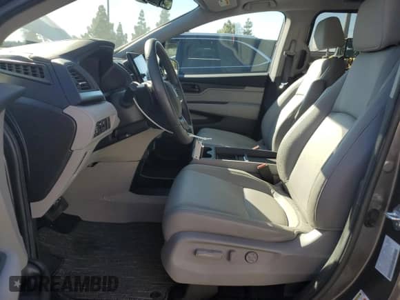 2024 Honda Odyssey EX-L with VIN 5FNRL6H64RB069069, listed as a Copart auction lot 87076955 with 15,204 mi miles and Salvage title. Bid and sale history available at DreamBid. Image 7.