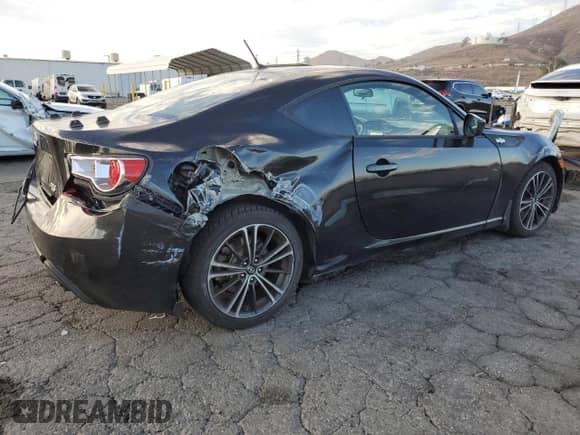 2013 Scion FR-S z VIN JF1ZNAA12D2704495, wystawiony jako Copart lot #82430005 z przebiegiem 130 918 mil mil oraz Szkoda całkowita • Salvage title. Historia ofert i sprzedaży dostępna na DreamBid. Obrazek 3.
