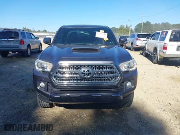 2016 Toyota Tacoma SR5 z VIN 5TFAZ5CN1GX009418, wystawiony jako IAAI lot #43365469 z przebiegiem 180 719 mil mil oraz . Historia ofert i sprzedaży dostępna na DreamBid. Obrazek 12.