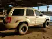 2000 Jeep Grand Cherokee Limited with VIN 1J4GW58N0YC419352, listed as a Copart auction lot 86405605 with 211,579 mi miles and Clean title. Bid and sale history available at DreamBid. Image 3.