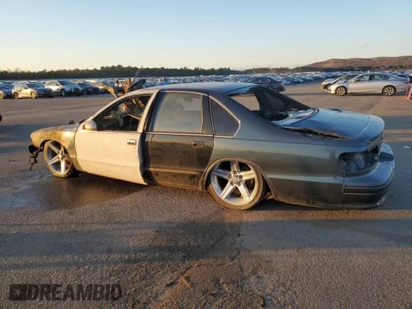 1995 Chevrolet Caprice с VIN 1G1BL52P9SR180058, выставлен на аукционе Copart как лот 48288085 с пробегом Не указан миль и На запчасти • Non repairable. История ставок и продаж доступна на DreamBid. Изображение 2.