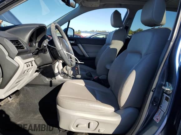 2015 Subaru Forester Touring with VIN JF2SJAWC5FH477385, listed as a Copart auction lot 86609875 with 65,497 mi miles and Salvage title. Bid and sale history available at DreamBid. Image 7.