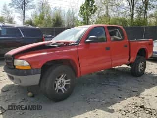 2003 Dodge Dakota Sport with VIN 1D7HG38X23S288703, listed as a Copart auction lot 53920575 with 260,506 mi miles and Salvage title. Bid and sale history available at DreamBid. Image 1.
