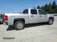 2010 Chevrolet Silverado 1500 LT with VIN 3GCRKSEAXAG210441, listed as a Copart auction lot 64805215 with 211,884 mi miles and Salvage title. Bid and sale history available at DreamBid. Image 3.