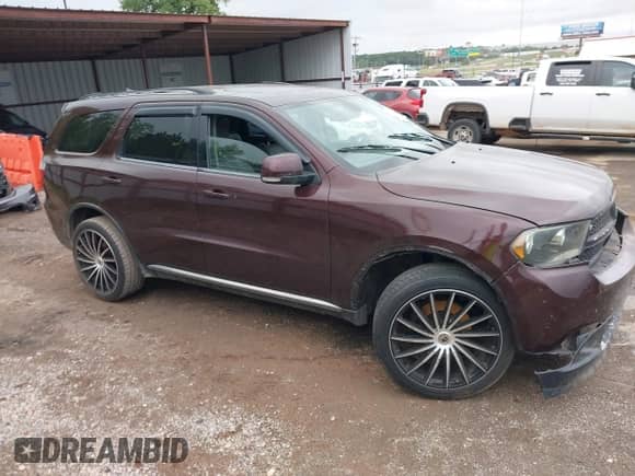 2012 Dodge Durango Crew with VIN 1C4RDHDG2CC144430, listed as a IAAI auction lot 43119474 with 252,855 mi miles and . Bid and sale history available at DreamBid. Image 13.