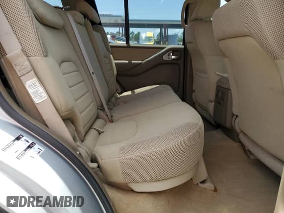 2006 Nissan Pathfinder S with VIN 5N1AR18U16C656086, listed as a Copart auction lot 58684965 with 83,503 mi miles and Salvage title. Bid and sale history available at DreamBid. Image 11.