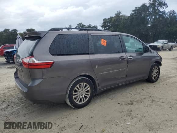 2015 Toyota Sienna XLE с VIN 5TDYK3DC9FS578672, выставлен на аукционе Copart как лот 82374545 с пробегом 167 324 миль миль и Списание • Salvage title. История ставок и продаж доступна на DreamBid. Изображение 3.