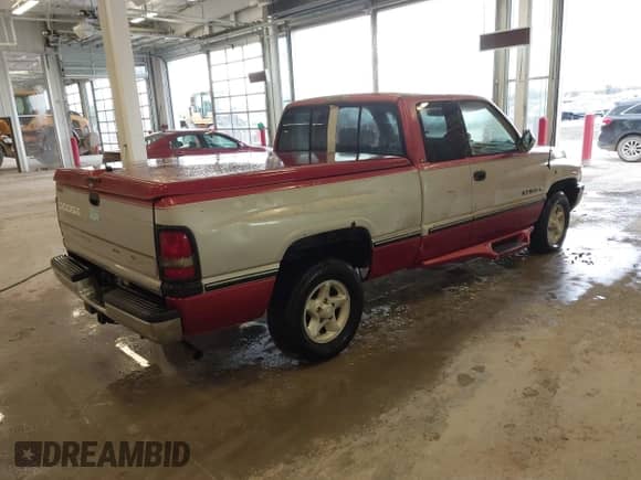 1997 Dodge 1500 with VIN 3B7HC13ZXVG772664, listed as a IAAI auction lot 41648778 with 144,047 mi miles and . Bid and sale history available at DreamBid. Image 4.