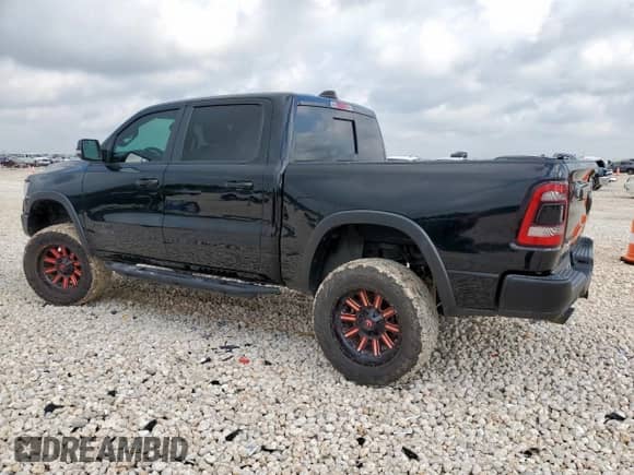 2020 Ram 1500 Rebel z VIN 1C6SRFLT6LN127034, wystawiony jako Copart lot #64791005 z przebiegiem 86 689 mil mil oraz Szkoda całkowita • Salvage title. Historia ofert i sprzedaży dostępna na DreamBid. Obrazek 2.