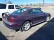 1996 Ford Mustang GT z VIN 1FALP42X2TF130573, wystawiony jako IAAI lot #43490908 z przebiegiem 281 802 mil mil oraz . Historia ofert i sprzedaży dostępna na DreamBid. Obrazek 4.