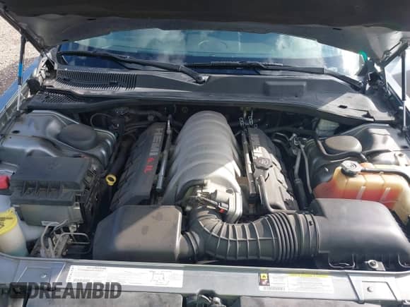 2006 Chrysler 300 C SRT-8 with VIN 2C3LA73W66H523504, listed as a IAAI auction lot 42483103 with 61,560 mi miles and . Bid and sale history available at DreamBid. Image 10.