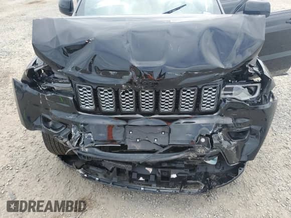 2020 Jeep Grand Cherokee Altitude with VIN 1C4RJEAG8LC203265, listed as a Copart auction lot 68113075 with 108,503 mi miles and Salvage title. Bid and sale history available at DreamBid. Image 12.