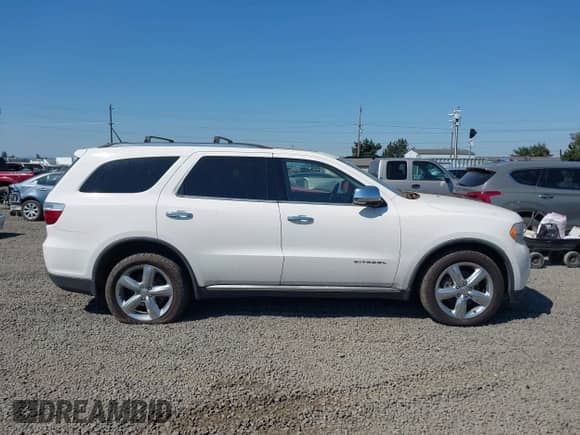 2012 Dodge Durango Citadel with VIN 1C4RDJEG4CC131247, listed as a IAAI auction lot 42439691 with 179,632 mi miles and . Bid and sale history available at DreamBid. Image 13.