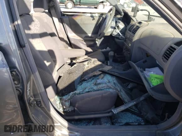 2003 Hyundai Accent GL с VIN KMHCG45CX3U482360, выставлен на аукционе Copart как лот 68657183 с пробегом Не указан миль и Списание • Salvage title. История ставок и продаж доступна на DreamBid. Изображение 7.