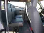 2009 Ford Econoline Cargo Commercial z VIN 1FTNE14W19DA19982, wystawiony jako IAAI lot #43311730 z przebiegiem 58 544 mil mil oraz . Historia ofert i sprzedaży dostępna na DreamBid. Obrazek 8.