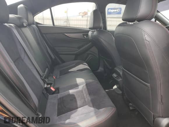2023 Subaru WRX Limited с VIN JF1VBAL64P9823421, выставлен на аукционе Copart как лот 52038585 с пробегом 14 794 миль миль и Списание • Salvage title. История ставок и продаж доступна на DreamBid. Изображение 11.
