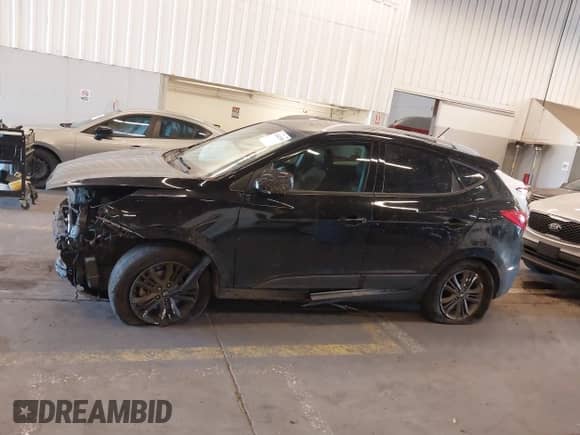 2014 Hyundai Tucson Limited with VIN KM8JU3AGXEU859629, listed as a IAAI auction lot 42441509 with 78,946 mi miles and . Bid and sale history available at DreamBid. Image 14.