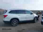 2021 Honda Pilot Touring 7-Passenger with VIN 5FNYF6H60MB037909, listed as a IAAI auction lot 41680637 with Not provided miles and . Bid and sale history available at DreamBid. Image 12.