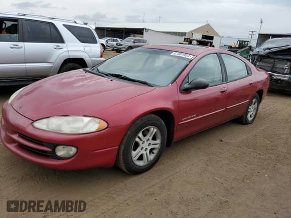 1999 Dodge Intrepid ES z VIN 2B3HD56J2XH771619, wystawiony jako Copart lot #67001954 z przebiegiem 241 655 mil mil oraz Czysty tytuł • Clean title. Historia ofert i sprzedaży dostępna na DreamBid. Obrazek 1.